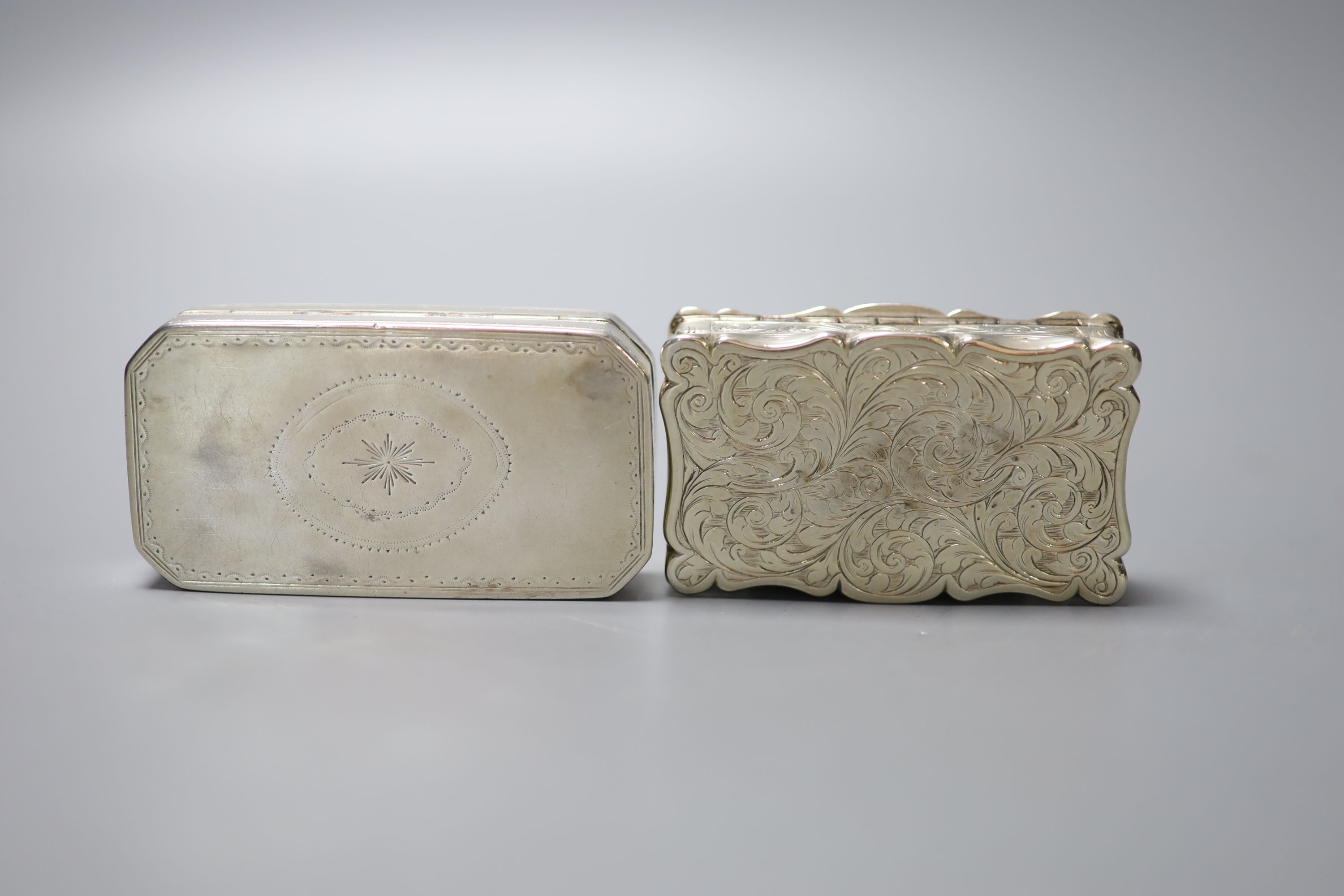 An early 19th century French engraved 950 standard octagonal snuff box, 84mm and a Victorian silver snuff box, Birmingham, 1852.